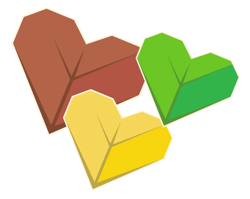 Trois cœurs en origami de tailles et de couleurs différentes.